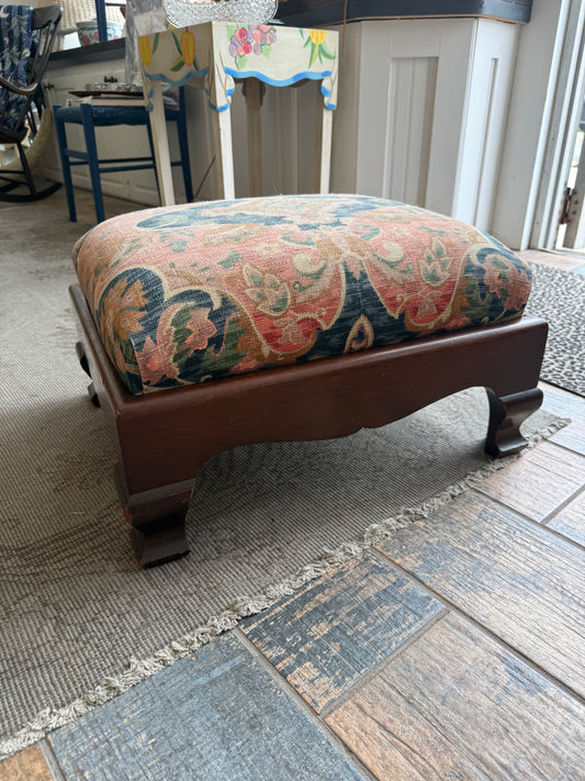 Upholstered footstool/ottoman