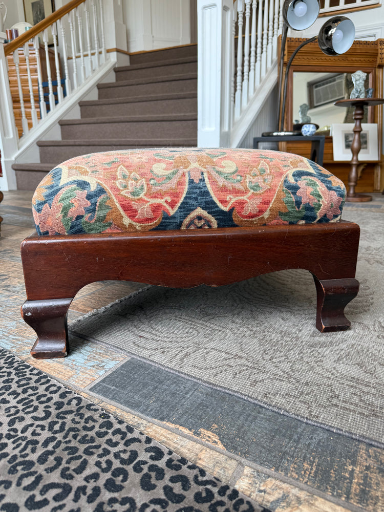 Upholstered footstool/ottoman
