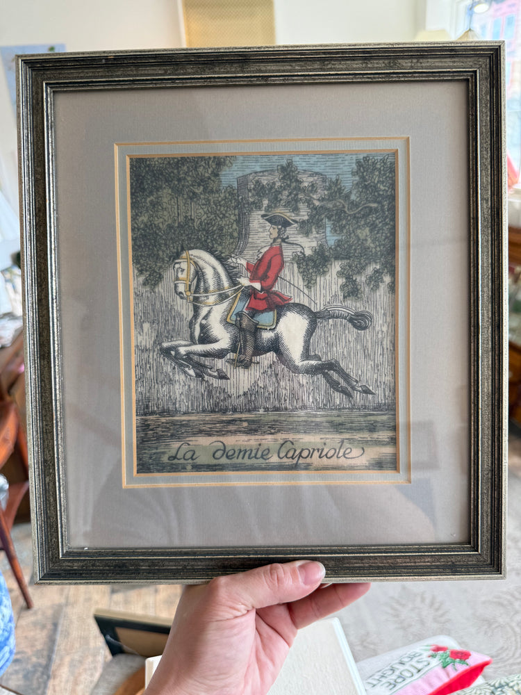 Framed “La demie Capriole” print