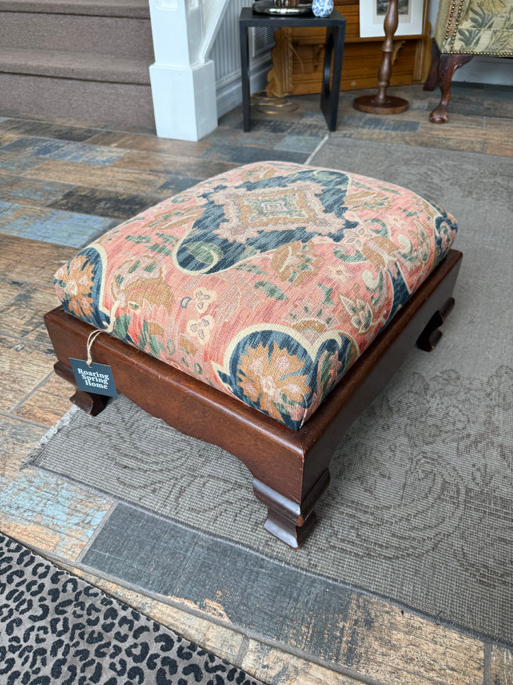 Upholstered footstool/ottoman