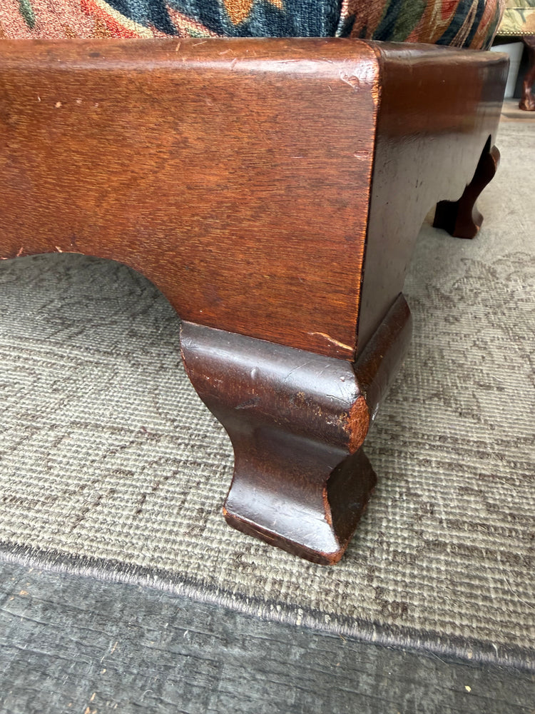 Upholstered footstool/ottoman